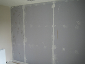 The completed acoustic wall sealed up with acoustic sealant prior to painting or plaster finish