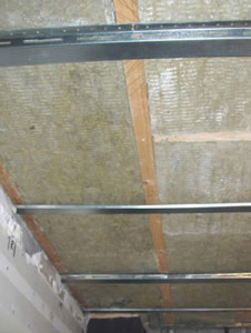 An acoustic ceiling fitted with insulation and ready for acoustic boards to be fitted, this is for both domestic and commercial use