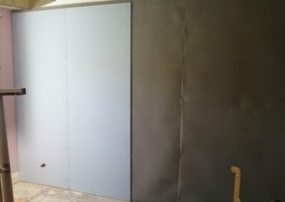 Second layer of sound block board after membrane installed
